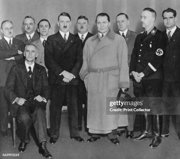 German Nazi party leaders, c1933. Adolf Hitler with other senior Nazis including Hanns Kerrl , Wilhelm Kube , Joseph Goebbels , Ernst Röhm , Hermann...