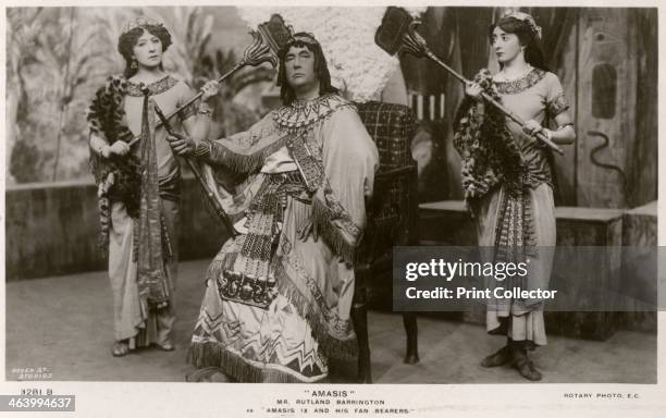Members of the cast of Amasis, c1906. Rutland Barrington as Amasis IX, and his fan bearers. Amasis is a musical comedy by Philip Michael Faraday and...