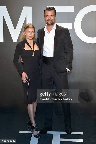Recording artist Fergie and actor Josh Duhamel, both wearing TOM FORD, attends the TOM FORD Autumn/Winter 2015 Womenswear Collection Presentation at...