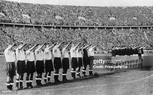 The infamous salute at the Berlin Olympic Stadium, Germany, 1938. Under pressure from British diplomats, the England football team , captained by...