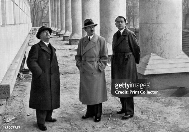 Adolf Hitler, with architects Professor Leonhard Gall and Albert Speer, Munich, Germany, 1934. Hitler , Gall 1884-1952) and Speer inspecting the...