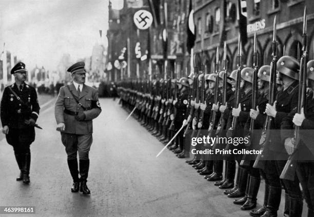 Adolf Hitler reviewing Leibstandarte troops at the Nuremberg Rally, Germany, 1935. Hitler inspecting soldiers of the Leibstandarte SS Adolf Hitler,...