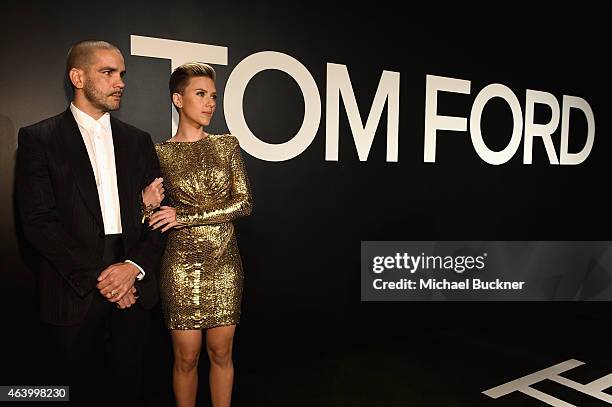 Journalist Romain Dauriac and actress Scarlett Johansson, both wearing TOM FORD, attend the TOM FORD Autumn/Winter 2015 Womenswear Collection...