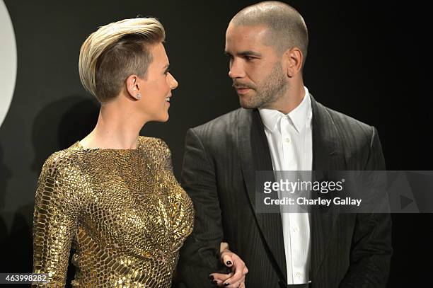 Actress Scarlett Johansson and journalist Romain Dauriac, both wearing TOM FORD, attend the TOM FORD Autumn/Winter 2015 Womenswear Collection...