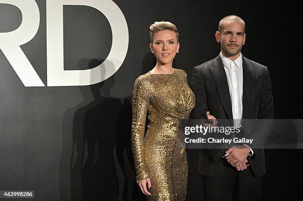 Actress Scarlett Johansson and journalist Romain Dauriac, both wearing TOM FORD, attend the TOM FORD Autumn/Winter 2015 Womenswear Collection...