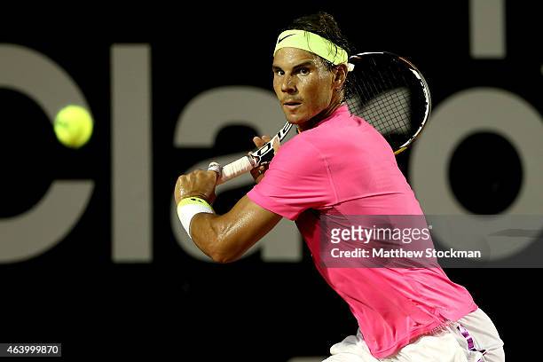 Rafael Nadal of Spain returns a shot to Pablo Cuevas of Uraguay during the Rio Open at the Jockey Club Brasileiro on February 20, 2015 in Rio de...