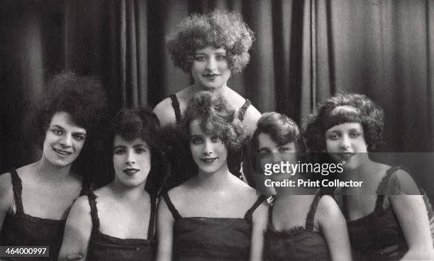 Dance or theatre group, c1900-1929. Postcard.