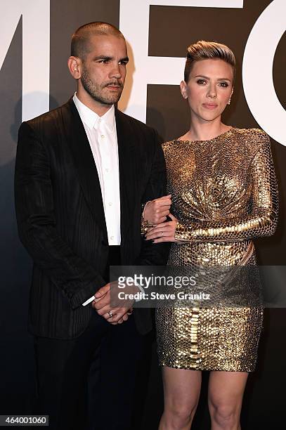 Journalist Romain Dauriac and actress Scarlett Johansson attend the TOM FORD Autumn/Winter 2015 Womenswear Collection Presentation at Milk Studios in...