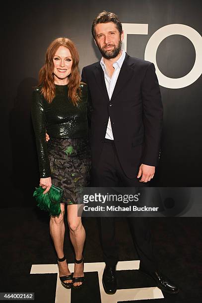 Actress Julianne Moore , wearing TOM FORD, and director Bart Freundlich attend the Tom Ford Autumn/Winter 2015 Womenswear Collection Presentation at...