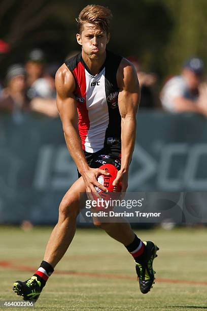 Sean Dempster runs with the ball during the St Kilda Saints AFL intra club match at Linen House Oval on February 21, 2015 in Melbourne, Australia.