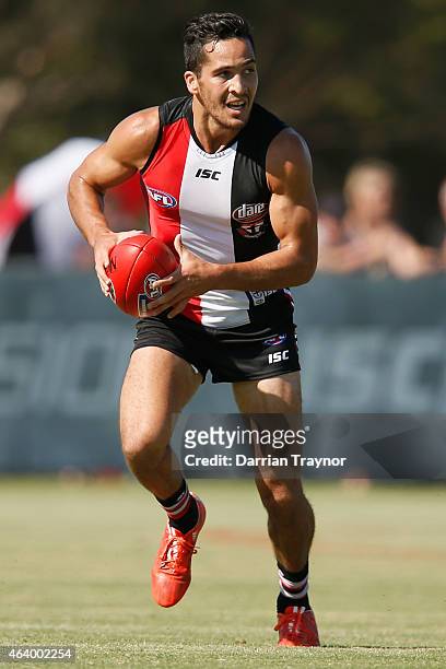 Shane Savage runs with the ball during the St Kilda Saints AFL intra club match at Linen House Oval on February 21, 2015 in Melbourne, Australia.