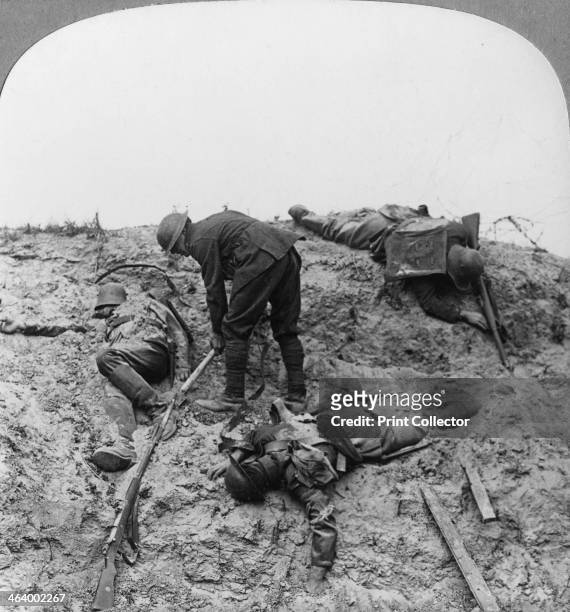 British casualties, Ypres salient, Belgium, World War I, 1915. Uncovering men who fell contesting the crater at Zouave Wood. Zouave Wood was stormed...