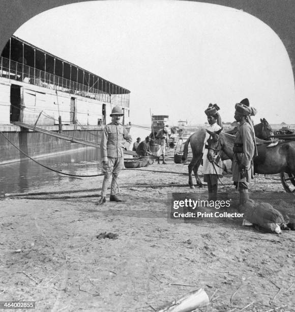 English officer and native soldiers, Bhamo, Burma, 1908. Stereoscopic card. Detail.
