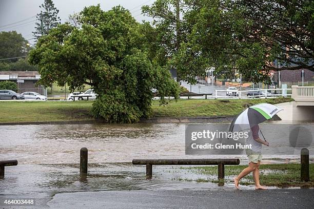 Norman Creek overflows at Stones Corner after a deluge of rain that has fallen from the remnants of Cyclone Marcia on February 21, 2015 in Brisbane,...