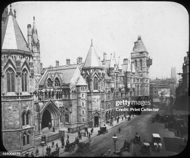 New Law Courts, London, late 19th century. Designed in Victorian Gothic style by George Edmund Street, the Royal Courts of Justice on the Strand were...