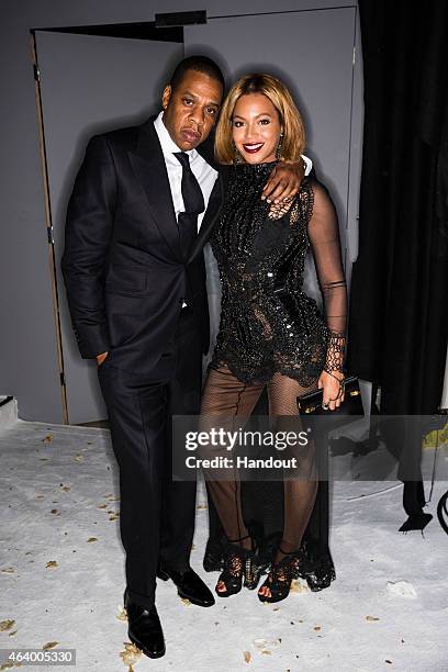 In this handout provided by Tom Ford, rapper Jay Z and singer Beyonce attend the TOM FORD Autumn/Winter 2015 Womenswear Collection Presentation at...