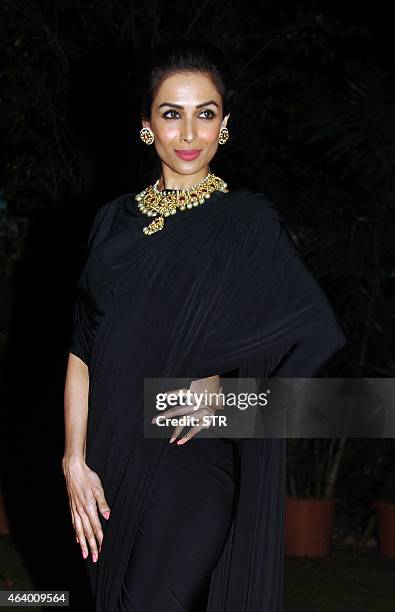 Indian Bollywood film actress Malaika Arora Khan attends the 'The Artisan Jewellery Awards 2014' ceremony in Mumbai on February 20, 2015. AFP PHOTO