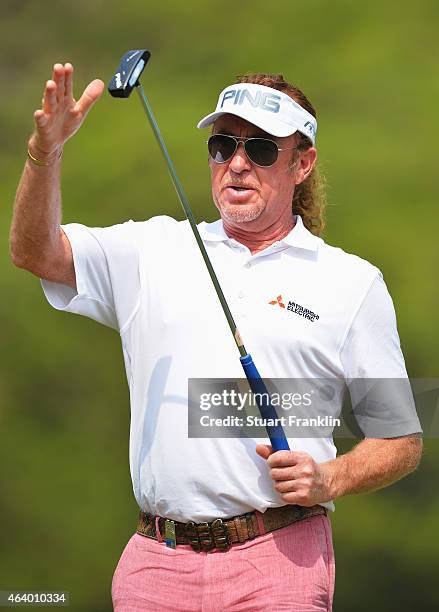Miguel Angel Jimenez of Spain celebrates a putt by pushing his putter as though he was replacing a sword in it holster during the third round of the...