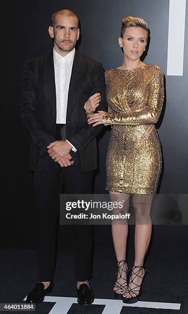 Actress Scarlett Johansson and husband Romain Dauriac arrive at Tom Ford Autumn/Winter 2015 Womenswear Collection Presentation at Milk Studios on...