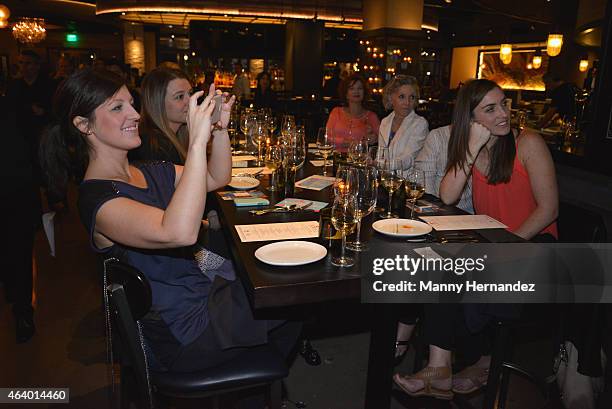 Guests enjoy SM USA Inc. Fine Italian Wines & Estates at the Tuscan Trio Dinner hosted by Fabio Viviani, Debi Mazar and Gabriele Corcos during the...