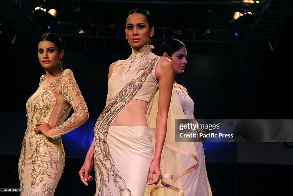 Models walk on the ramp for designer Gaurav Gupta Show at...