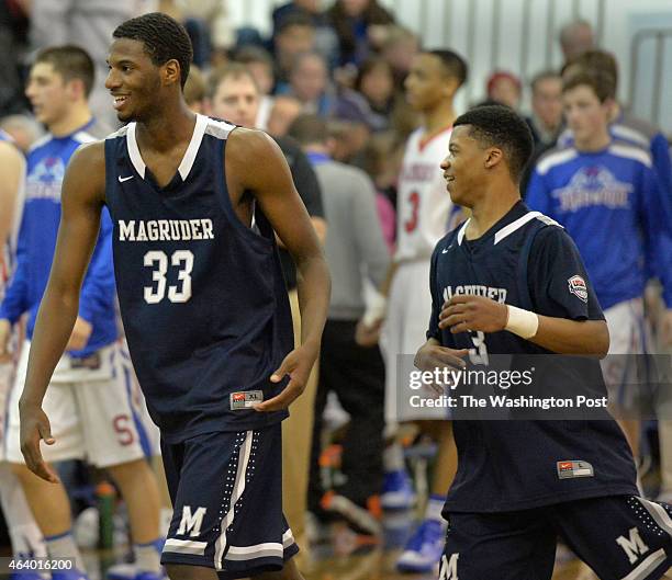 Magruder's Joe Hugley and David Garey were all smiles after the close game with Sherwood ended on February 20, 2015 in Olney, Md.