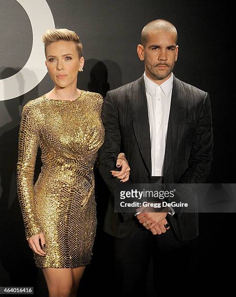 Actress Scarlett Johansson and husband Romain Dauriac arrive at the Tom Ford Autumn/Winter 2015 Womenswear Collection Presentation at Milk Studios on...