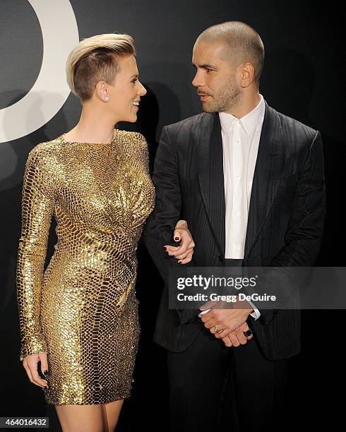 Actress Scarlett Johansson and husband Romain Dauriac arrive at the Tom Ford Autumn/Winter 2015 Womenswear Collection Presentation at Milk Studios on...