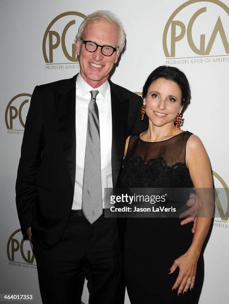 Actress Julia Louis-Dreyfus and husband Brad Hall attend the 25th annual Producers Guild Awards at The Beverly Hilton Hotel on January 19, 2014 in...