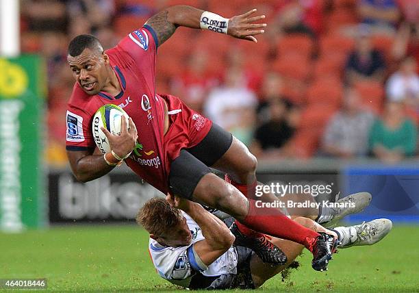 Samu Kerevi of the Reds is tackled during the round two Super Rugby match between the Reds and the Force at Suncorp Stadium on February 21, 2015 in...