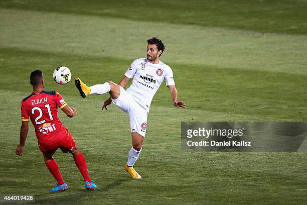 Labinot Haliti of the Wanderers competes for the ball with Tarek Elrich of United during the round 18 A-League match between Adelaide United and...