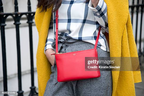 Fashion Blogger Brit Romero wears a Celine bag and Zara jacket, top, trousers. On day 1 of London Collections: Women on February 20, 2015 in London,...