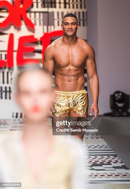 Model walks the runway at the Fashion For Relief charity fashion show to kick off London Fashion Week Fall/Winter 2015/16 at Somerset House on...