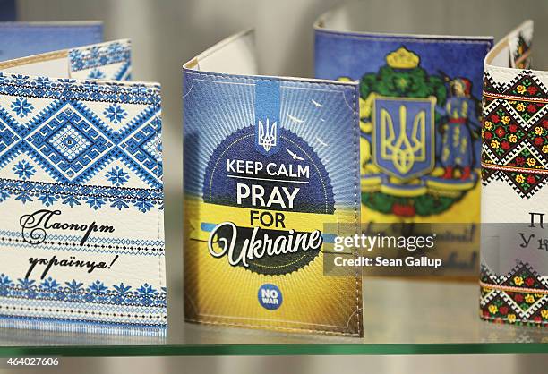Postcard, in a slogan similar to the famous "Keep Calm And Carry On" of World War II London, urges one to "Keep Calm" and "Pray for Ukraine" at a...