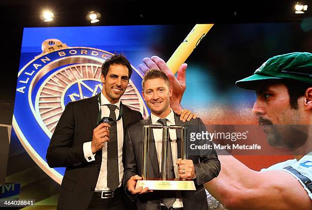 Mitchell Johnson poses with Michael Clarke after winning the Allan Border Medal during the 2014 Allan Border Medal at Doltone House on January 20,...