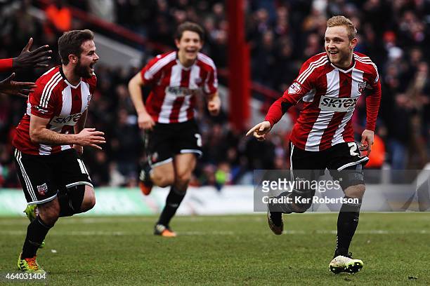 Alex Pritchard of Brentford celebrates scoring his sides second goal during the Sky Bet Championship match between Brentford and AFC Bournemouth at...