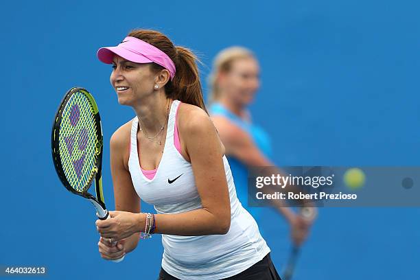 Barbara Schett of Austria and Iva Majoli of Croatia in action in their Women's Legends' Doubles match against Tracy Austin and Mary Joe Fernandez of...