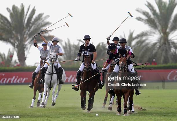 Sheikha Maitha of UAE reaches for the ball as she plays against Desert Palm on the final day of the Cartier International Dubai Polo Challenge 10th...