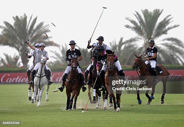 Sheikha Maitha of UAE reaches for the ball as she plays against Desert Palm on the final day of the Cartier International Dubai Polo Challenge 10th...