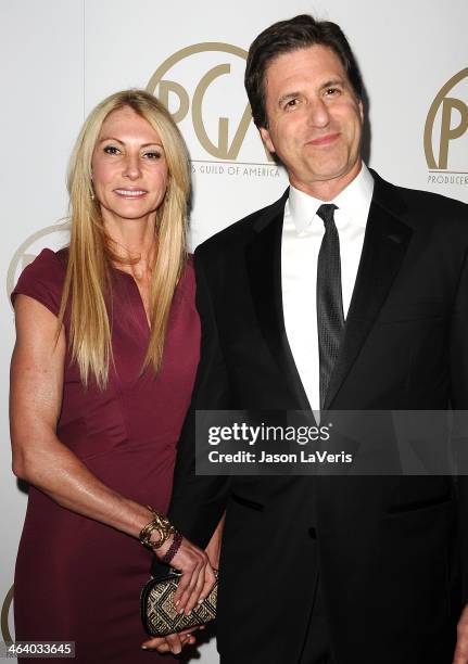 Producer Steven Levitan and wife Krista Levitan attend the 25th annual Producers Guild Awards at The Beverly Hilton Hotel on January 19, 2014 in...