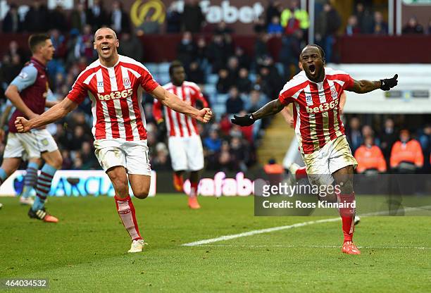 Victor Moses of Stoke City celebrates scoring their second goal with Jonathan Walters of Stoke City during the Barclays Premier League match between...