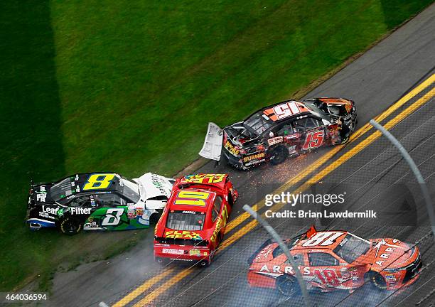 Daniel Suarez, driver of the ARRIS Toyota, Carlos Contreras, driver of the BurnieGrill/BubbaGrill/LillyTrucking Chevrolet, Landon Cassill, driver of...