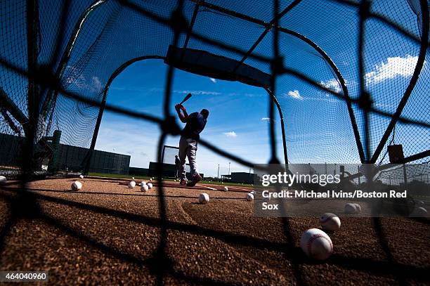 Mookie Betts of the Boston Red Sox takes batting practice during a Spring Training workout at Fenway South on February 21, 2015 in Fort Myers,...