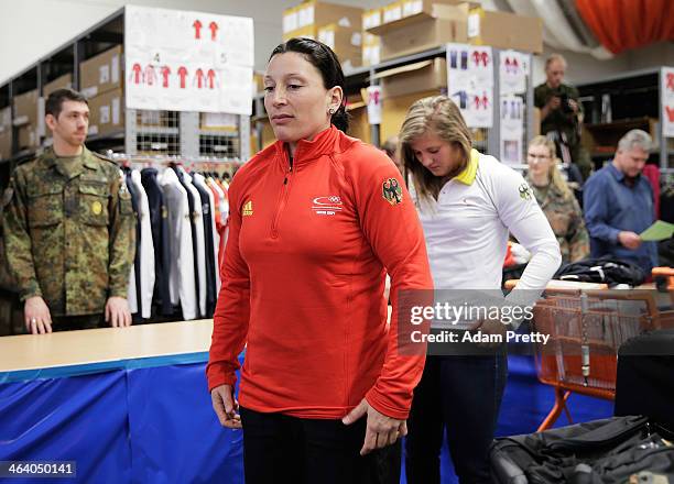 Anja Schneider Heinze and Stephanie Schneider of Germany try on their their Olympic uniform and kit during the Media Day And Kit Handover on January...