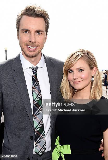 Actor Dax Shepard poses with actress Kristen Bell outside the FIJI Water tent during the 30th Annual Film Independent Spirit Awards at Santa Monica...