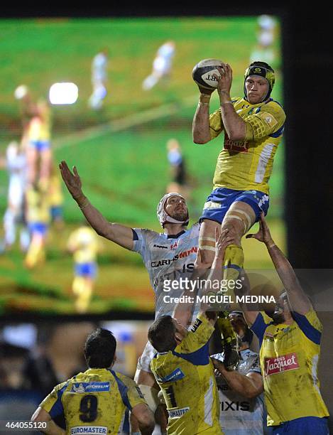 Clermont's French flanker Julien Bonnaire grabs the ball in a line out during the French Top 14 rugby union match between Racing Metro 92 and ASM...