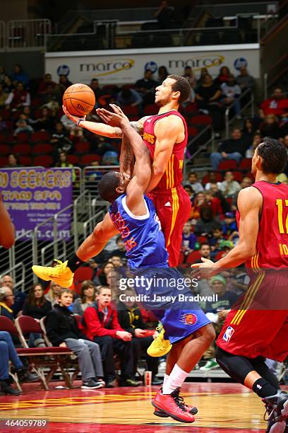 Trey McKinney Jones of the Fort Wayne Mad Ants drives to the basket against Othyus Jeffers of the Iowa Energy in an NBA D-League game on January 18,...