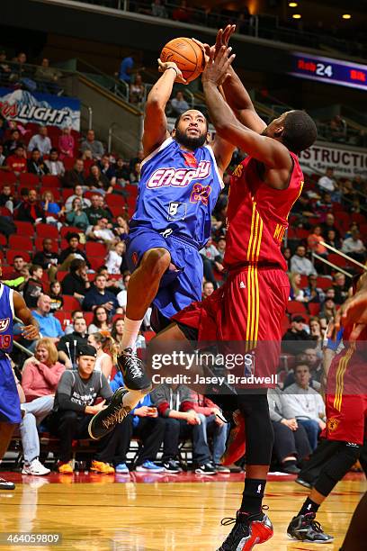 Austin Freeman of the Iowa Energy shoots over Tony Mitchell of the Fort Wayne Mad Ants in an NBA D-League game on January 18, 2014 at the Wells Fargo...