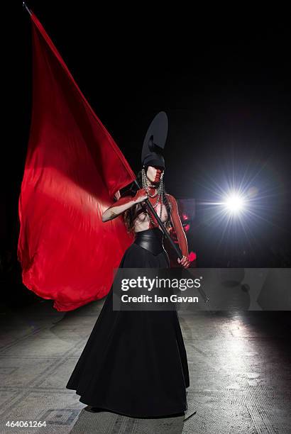Model walks the runway at the Gareth Pugh show during London Fashion Week Fall/Winter 2015/16 at Victoria & Albert Museum on February 21, 2015 in...