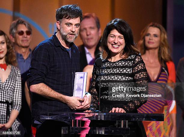 Director Paul Thomas Anderson and casting director Cassandra Kulukundis accept the Robert Altman Award for 'Inherent Vice' onstage during the 2015...